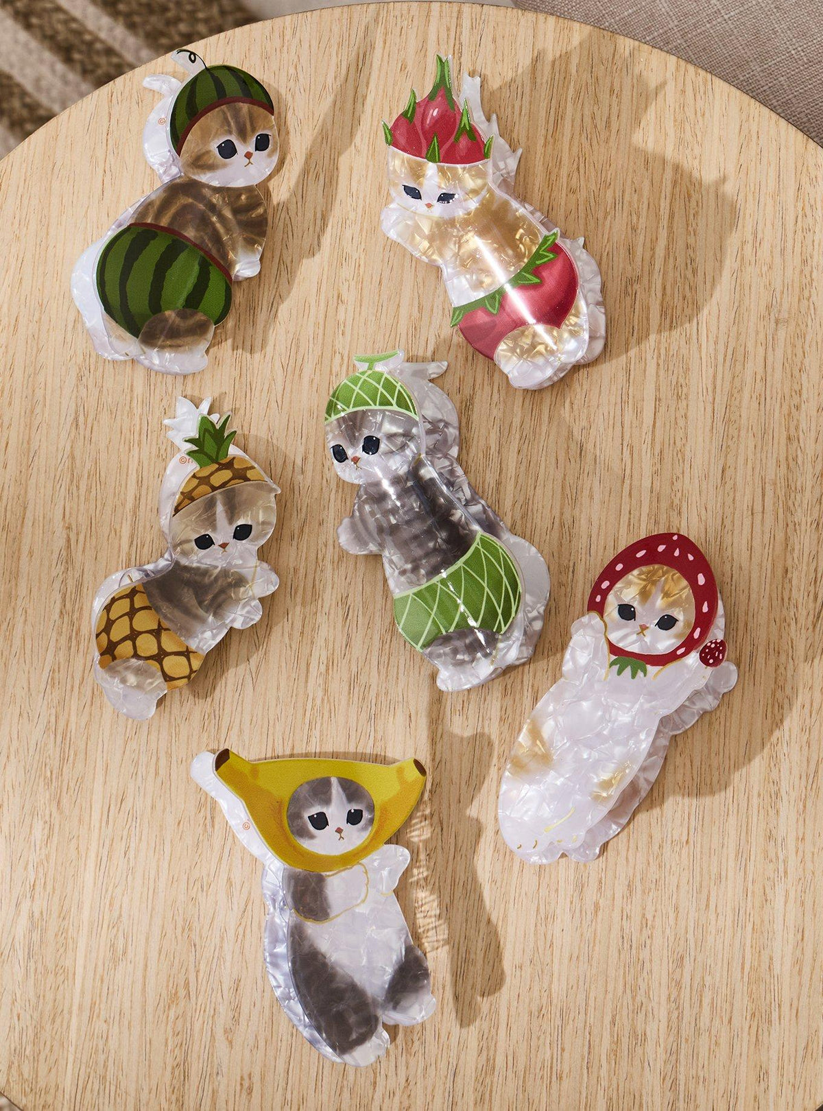 Pinza tipo garra sorpresa Mofusand de gatos frutales
