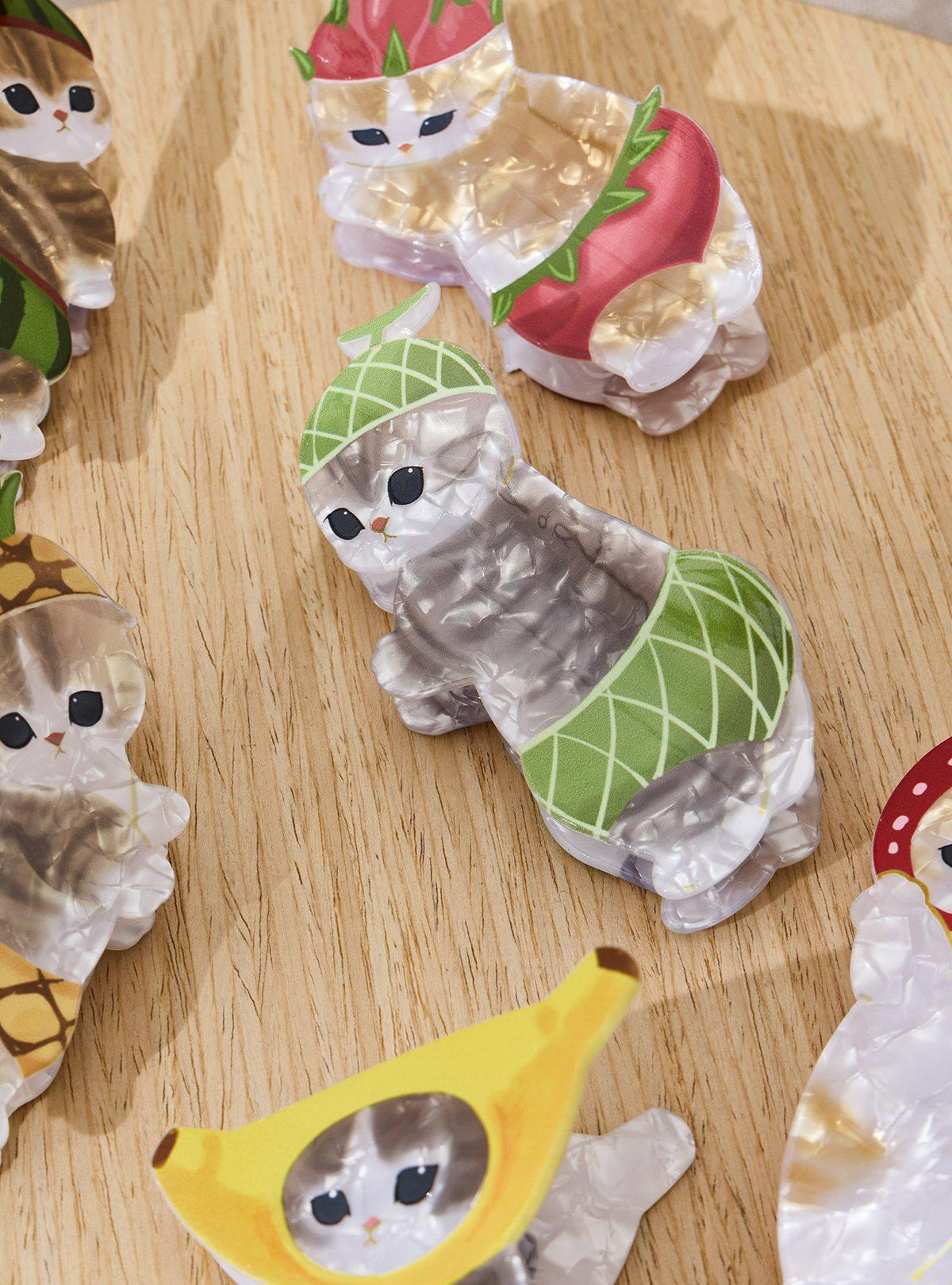 Pinza tipo garra sorpresa Mofusand de gatos frutales