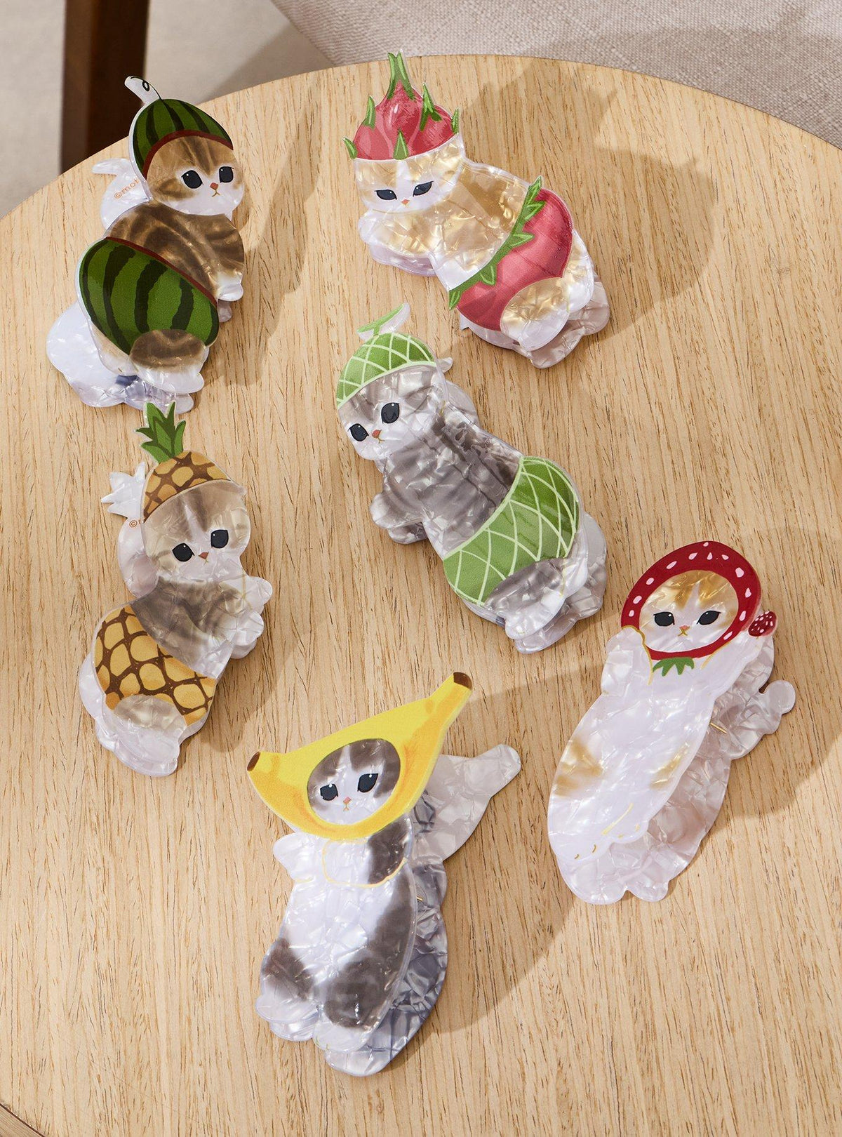Pinza tipo garra sorpresa Mofusand de gatos frutales