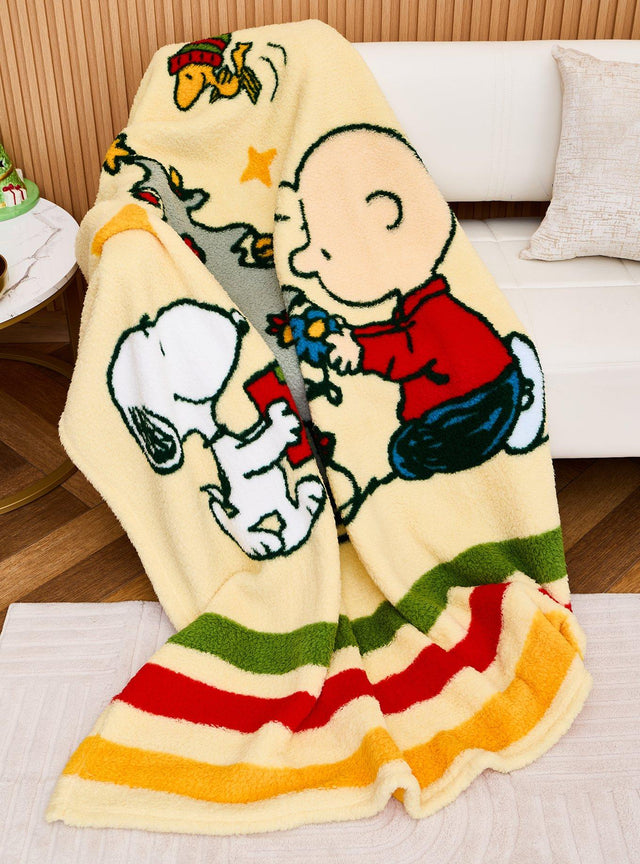 Manta sherpa festiva de Snoopy y Charlie Brown