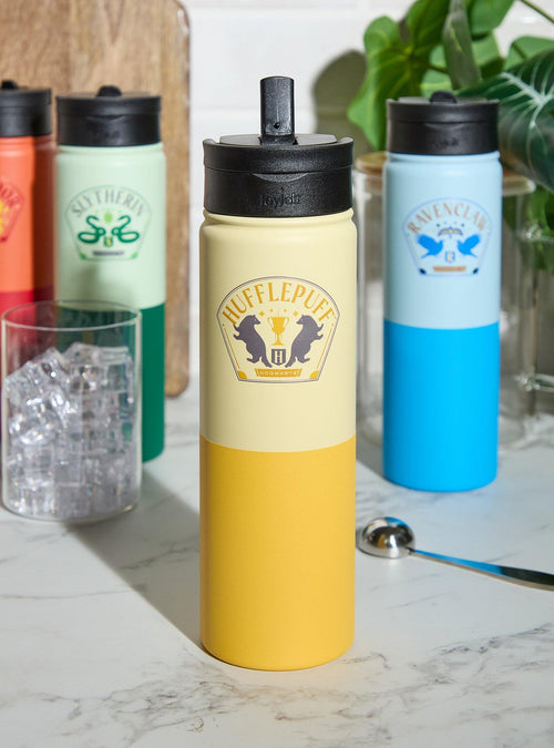 Botella de agua con logo de Hufflepuff