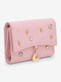 Billetera Sailor Moon con dijes y detalles brillantes