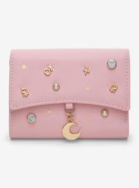 Billetera Sailor Moon con dijes y detalles brillantes