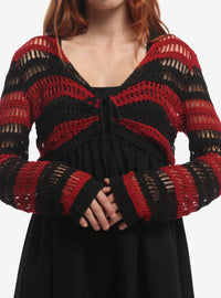 Bolero tejido a rayas rojas y negras con estrellas