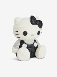 Figura de vinilo Hello Kitty #307 que brilla en la oscuridad