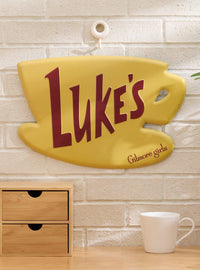 Letrero metálico de pared con logo de Luke's Diner