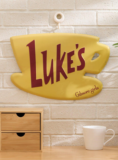 Letrero metálico de pared con logo de Luke's Diner