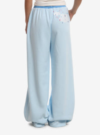 Pantalón baggy de Cinnamoroll con osito y nubes