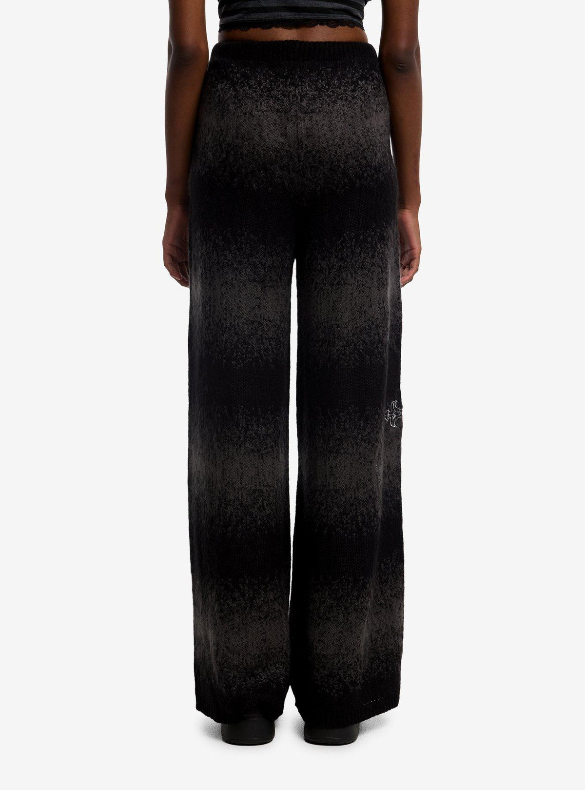 Pantalón de buzo degradado Social Collision con espada