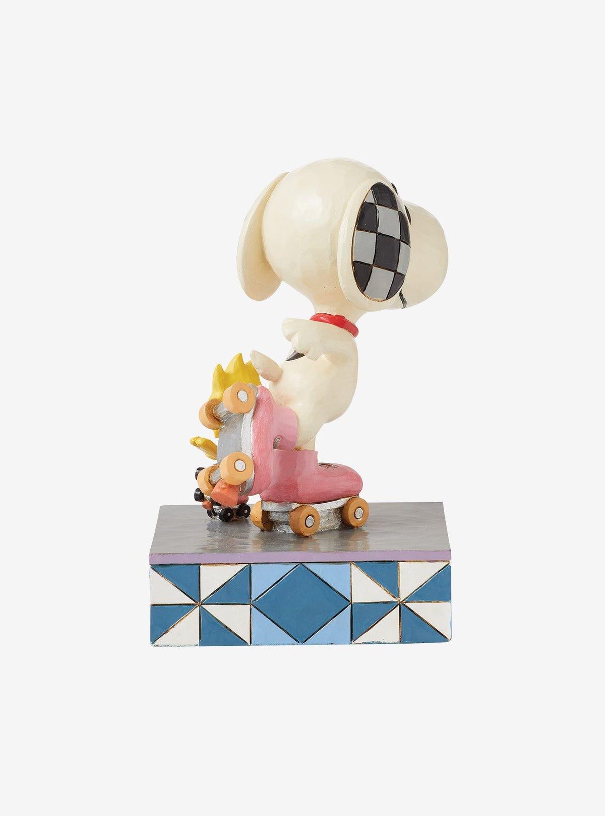 Figura de Snoopy y Woodstock patinando