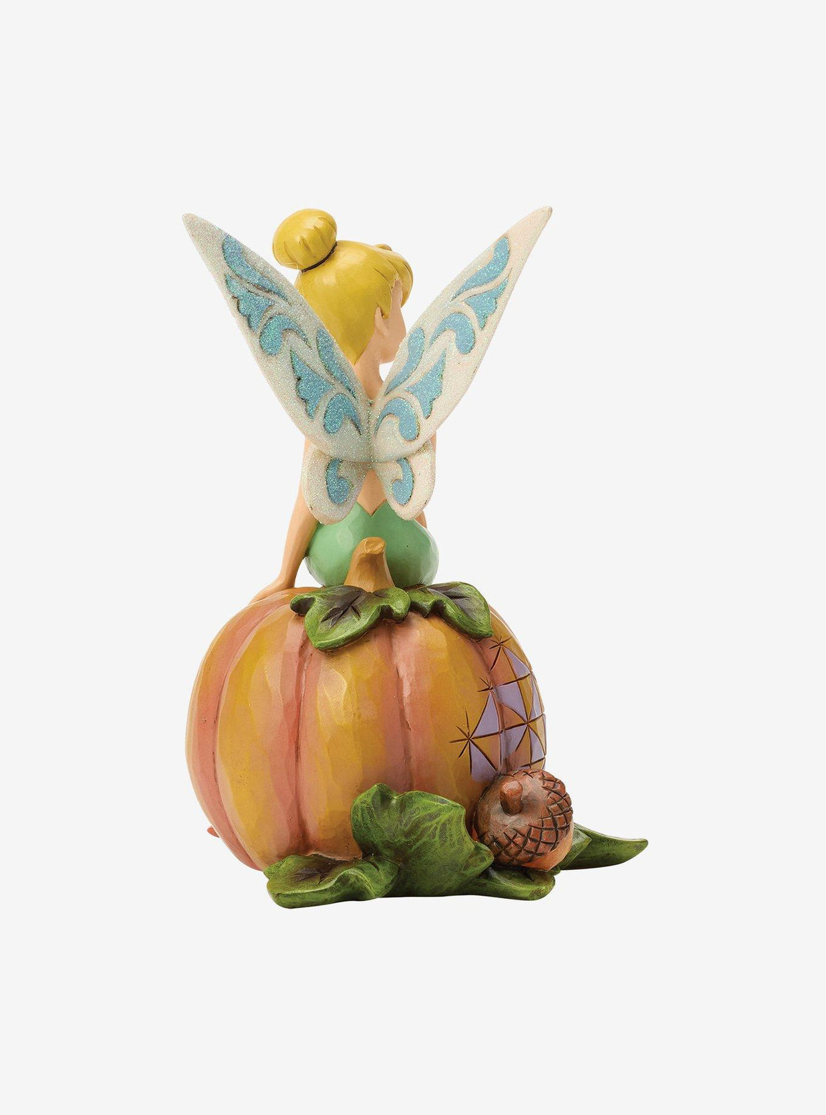 Figura Disney de Tinker Bell sobre una calabaza