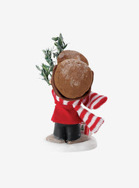 Figura de Charlie Brown con árbol de Navidad