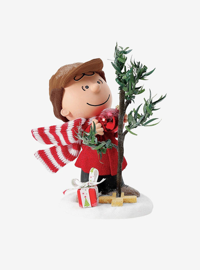 Figura de Charlie Brown con árbol de Navidad