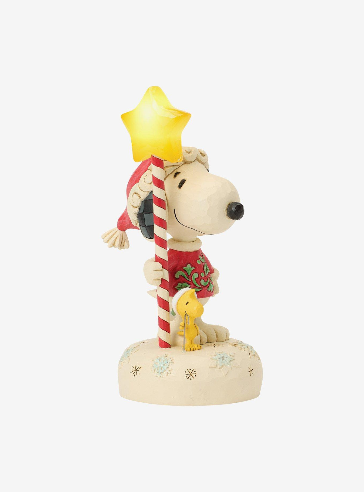 Figura iluminada de Snoopy con bastón de estrella