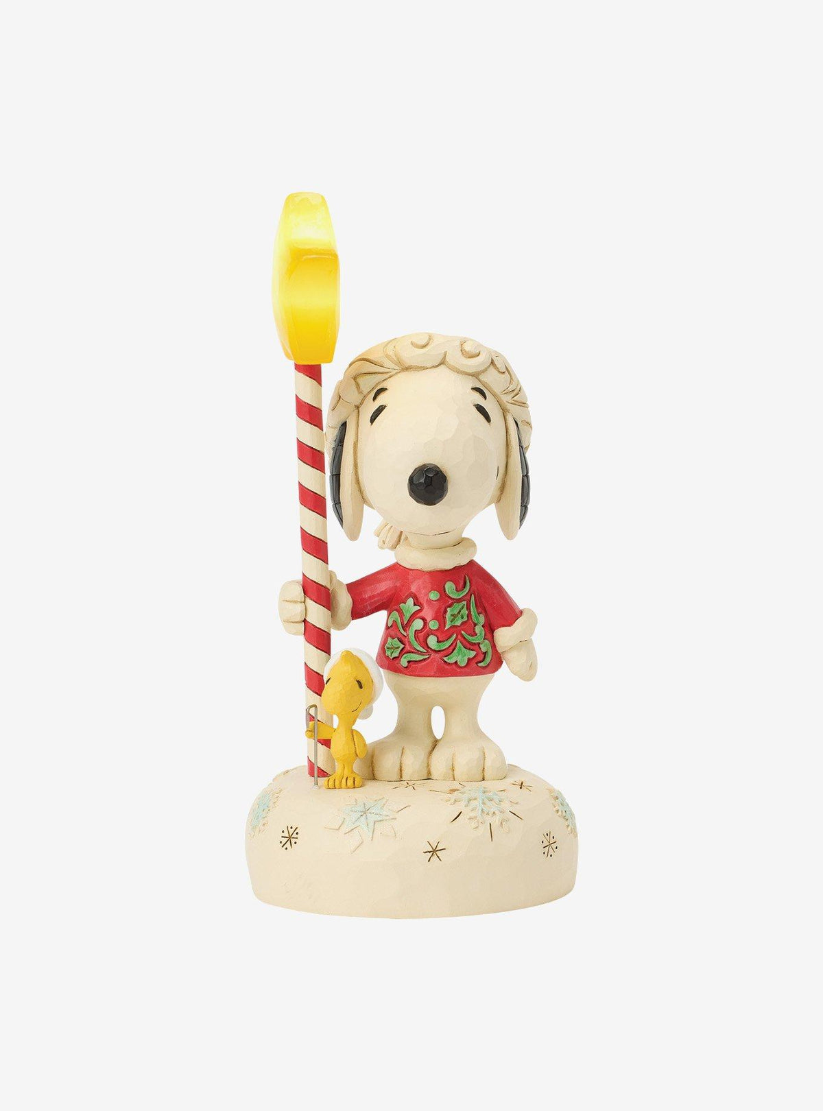 Figura iluminada de Snoopy con bastón de estrella