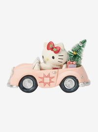 Figura navideña de Hello Kitty en auto