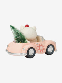 Figura navideña de Hello Kitty en auto