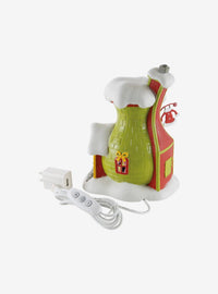 Figura del Grinch en su tienda de trajes de Santy