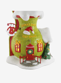 Figura del Grinch en su tienda de trajes de Santy