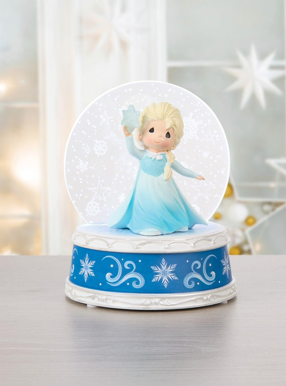Figura musical LED de Elsa con copos de nieve