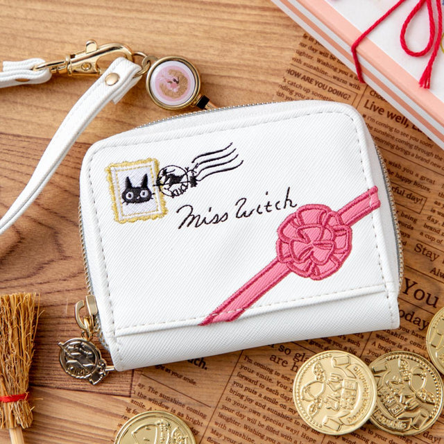 Estuche de monedas y tarjetas Kiki con carrete