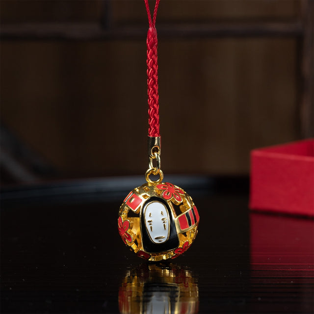 Campanilla de Spirited Away con No-Face