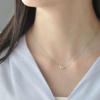 Collar de Flounder en oro blanco 10K con diamante y perla