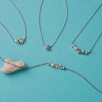 Collar de Flounder en oro blanco 10K con diamante y perla