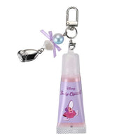 Bálsamo labial rosa con llavero de las ostritas