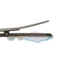 Accesorio sorpresa para el pelo de Elsa