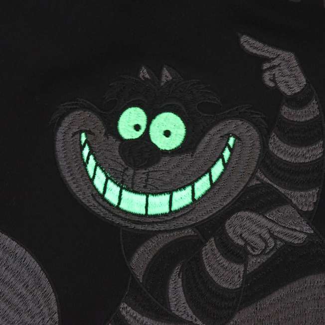 Polerón negro del Gato de Cheshire que brilla en la oscuridad