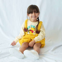 Pantalón infantil Winnie the Pooh con tirantes, amarillo 90–100