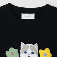 Polera negra mofusand con gato bicolor café