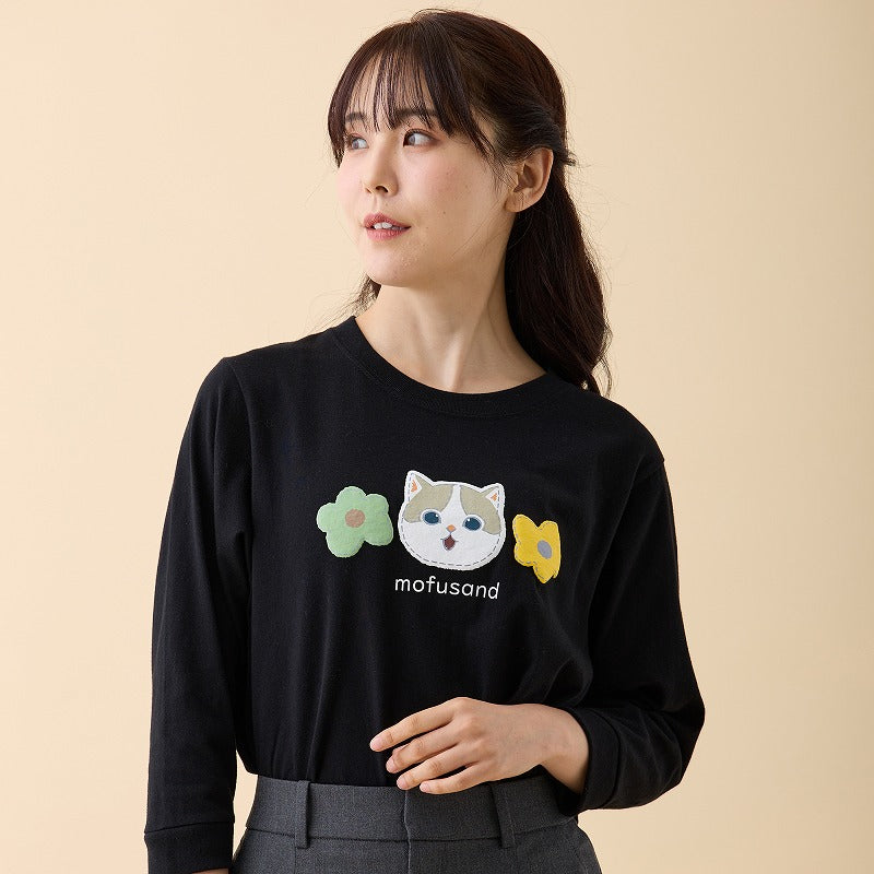 Polera negra mofusand con gato bicolor café