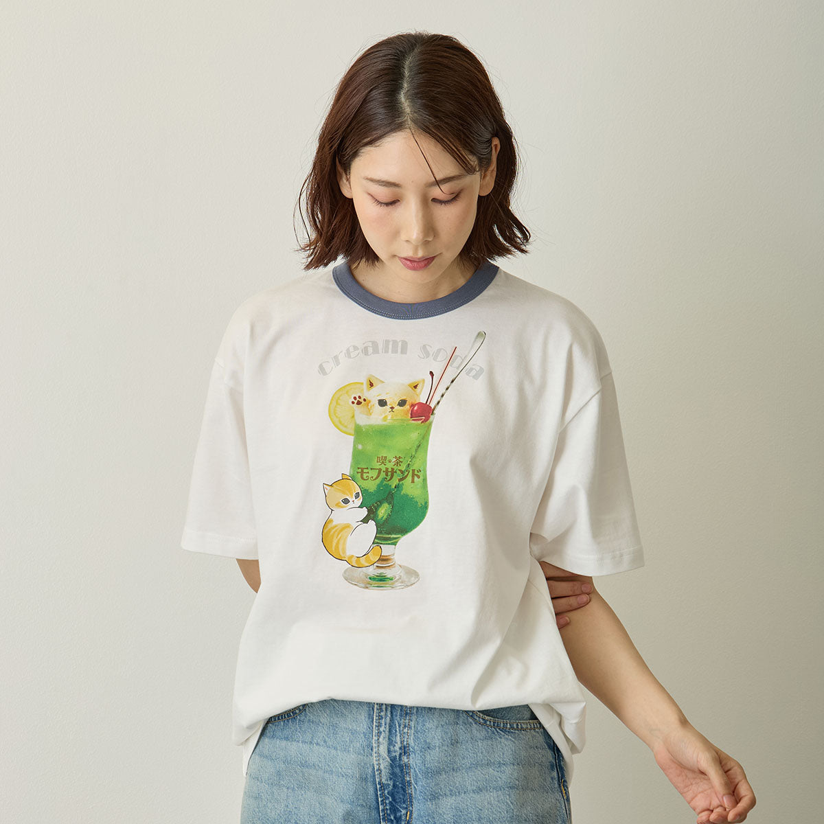 Polera blanca Mofusand con soda de melón