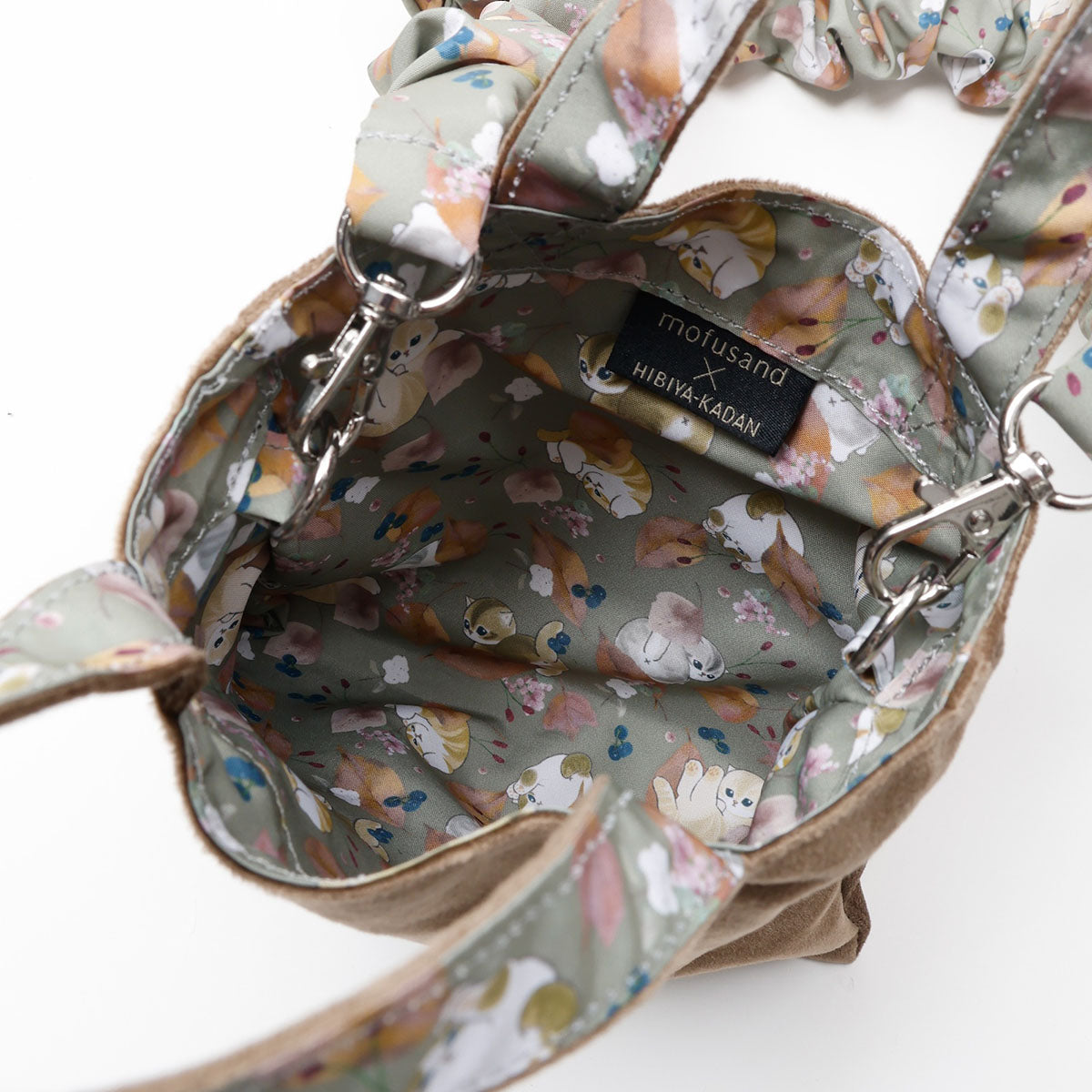 Minibolso reversible mofusand con hojas, color oliva