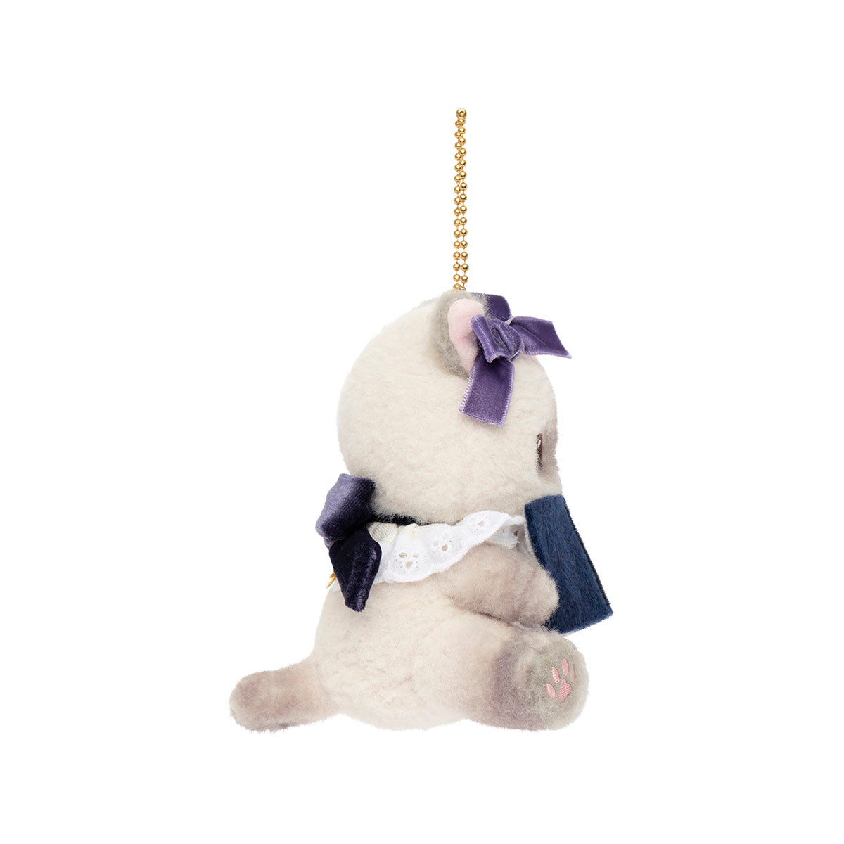 Peluche mofusand gato siamés lector