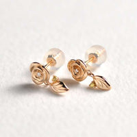 Aros La Bella y la Bestia en oro rosa K10, diamantes y zafiros