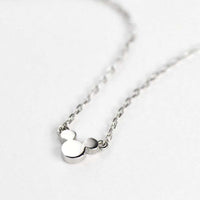 Collar con colgante de Mickey Mouse en platino y diamante