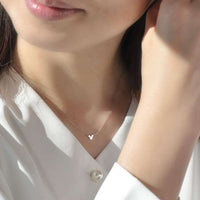 Collar con colgante de Mickey Mouse en platino y diamante