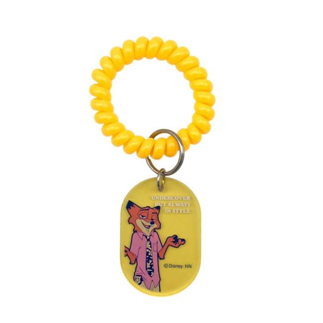 Coletero espiral con charm de Nick – Zootopia 2