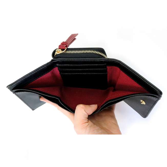Billetera mini de Cruella con marco metálico
