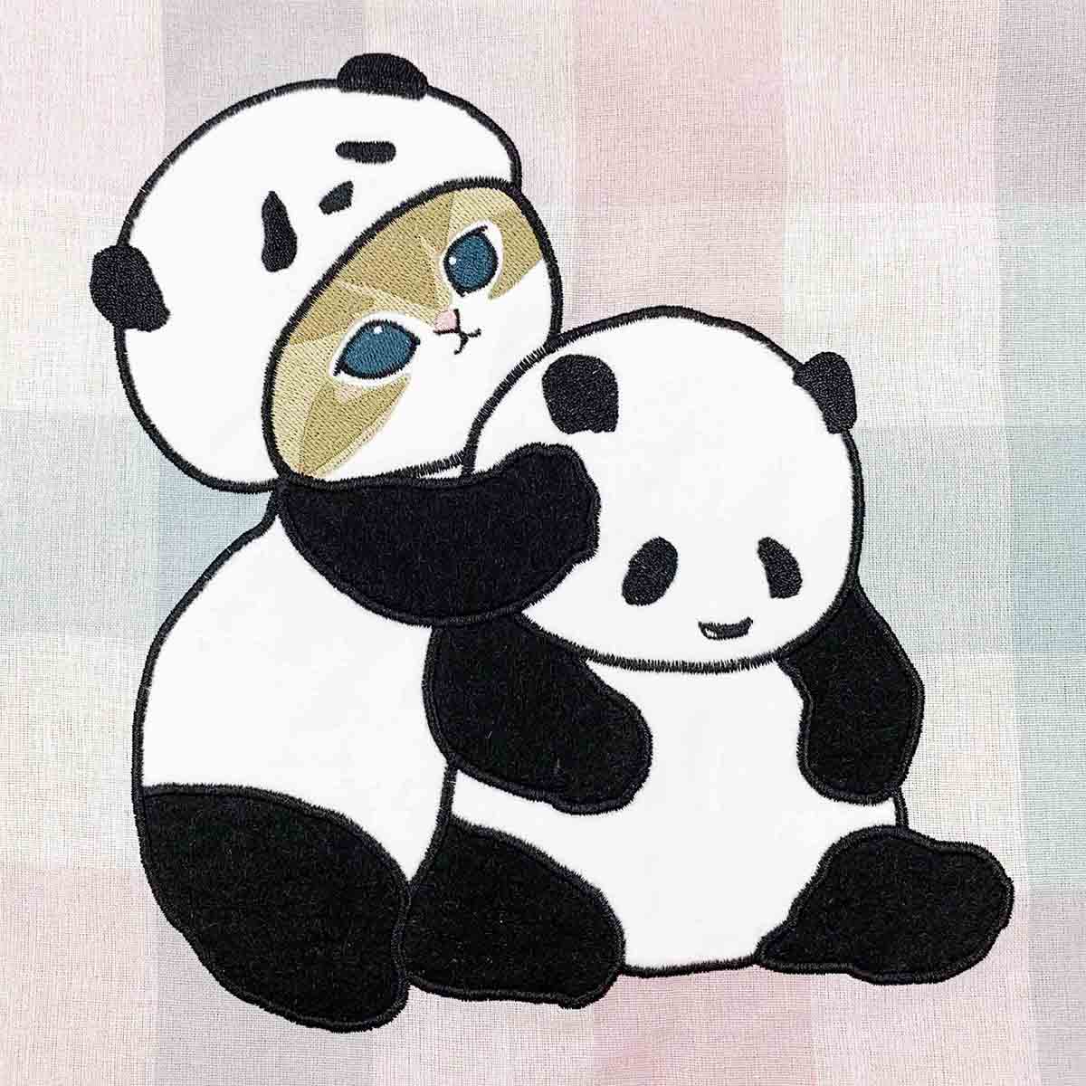 Delantal Mofusand de gatito panda