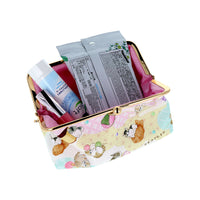 Estuche con broche Mofusand y dulces japoneses