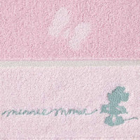 Toalla de mano rosa con siluetas de Minnie y Mickey