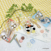 Estuche transparente con cadena mofusand - Gatito panda