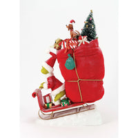 Figura navideña del Grinch y Max
