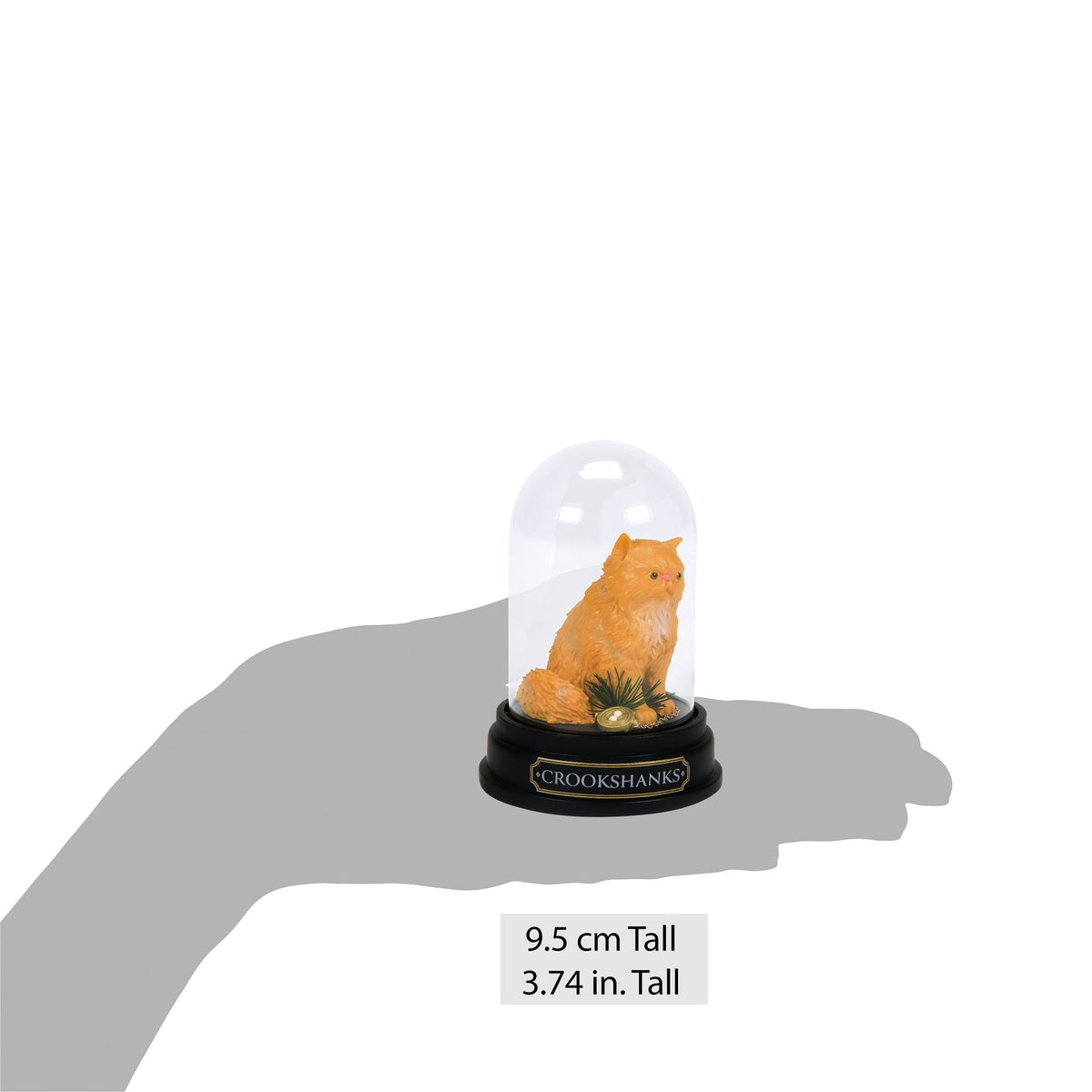 Figura de Crookshanks bajo domo de vidrio