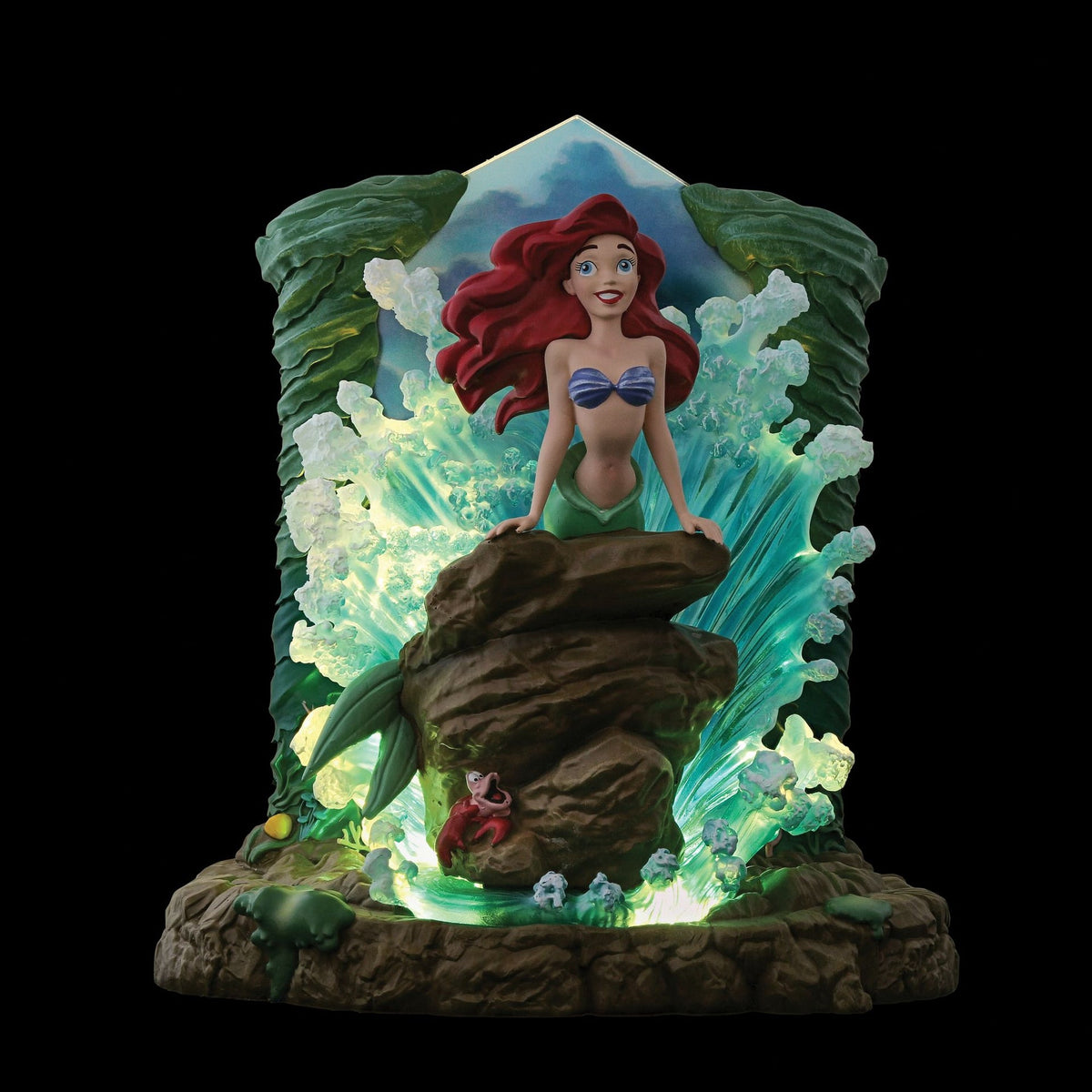 Figura iluminada de Ariel y Sebastián – La Sirenita
