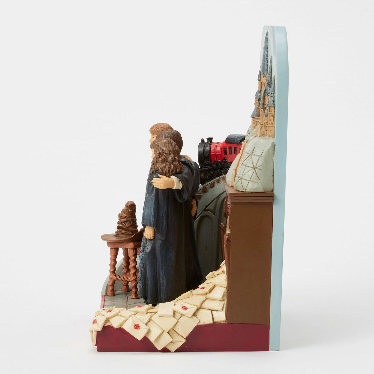 Figura Harry Potter: Trío frente al castillo de Hogwarts